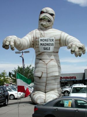 Giant mummy sells Toyotas.
