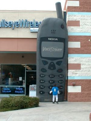 Giant cell phone sells cell phones.
