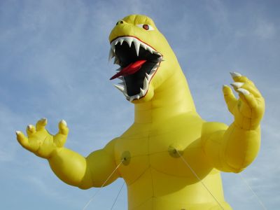 Giant yellow lizard sells Toyotas.
